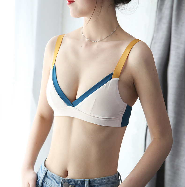 Woman wearing a stylish French Cotton Bra in white and blue with yellow straps