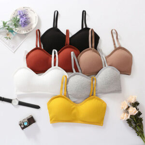 A collection of Fitness Thread Push Up Bras in various colors including yellow, white, grey, and black.